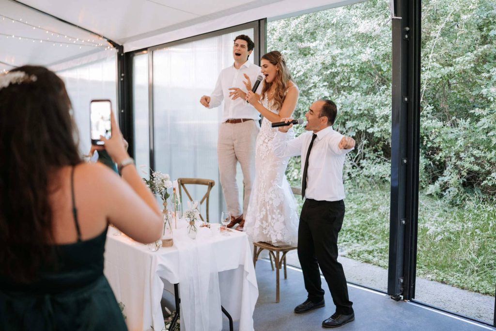 2.-Singing-Waiters-in-France-Bride-and-groom-singing-Marc-at-Chateau-du-fey