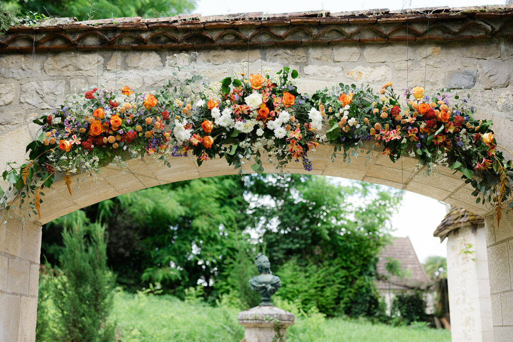 Married-under-an-arch-of-magnificent-flowes